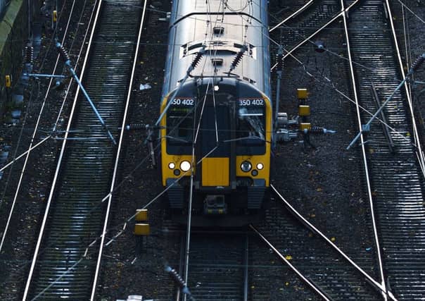 Scotrail trains arrive and depart from Waverley Station, Edinburgh