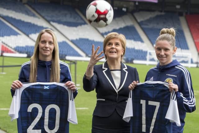 First Minister, Nicola Sturgeon, with Leanne Rossand Joelle Murray.