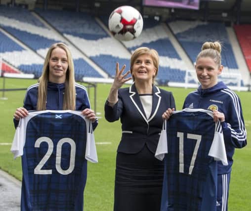 First Minister, Nicola Sturgeon, with Leanne Rossand Joelle Murray.