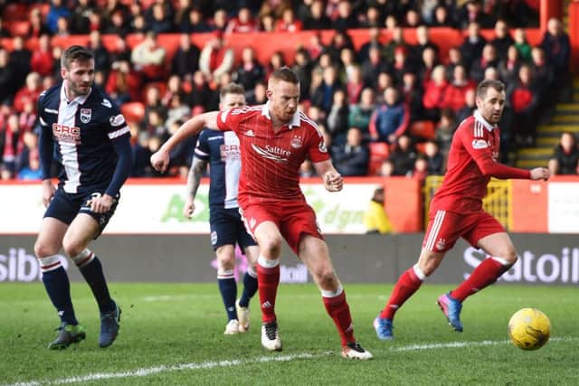 Aberdeen nets the winner over Ross County. Picture: SNS/