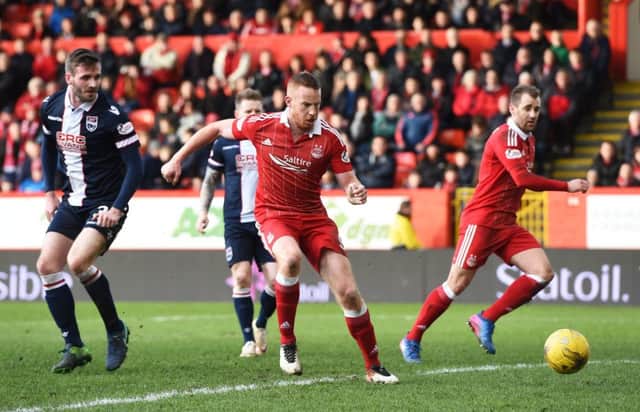 Aberdeen nets the winner over Ross County. Picture: SNS/