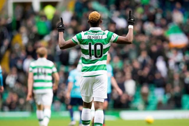 Celtic Moussa Dembele celebrates scoring his side's second goal of the game against Hamilton. Picture: PA Wire/Jeff Holmes