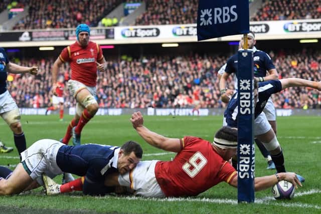 Rhys Webb thinks he is over the line, but Tim Vissers efforts ensured the try was not awarded. Picture: Stu Forster/Getty Images