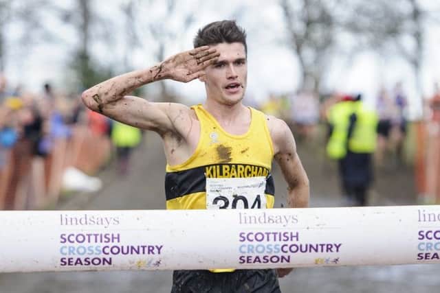 Callum Hawkins crosses the line in 33 mins 34 secs after battling the elements. Picture: Bobby Gavin/Scottish Athletics.