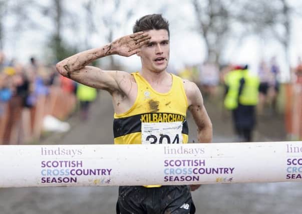 Callum Hawkins crosses the line in 33 mins 34 secs after battling the elements. Picture: Bobby Gavin/Scottish Athletics.