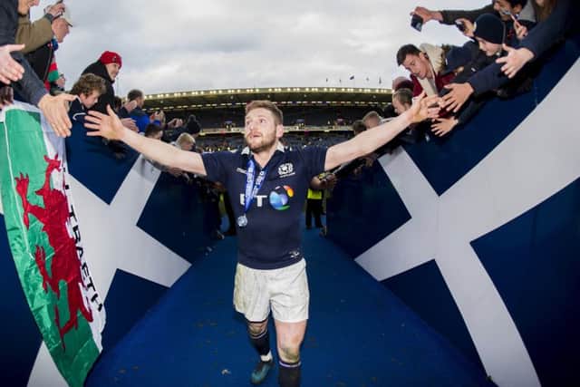 Finn Russell acclaims Scotland's victory over Wales at full-time on Saturday. Picture: SNS/SRU