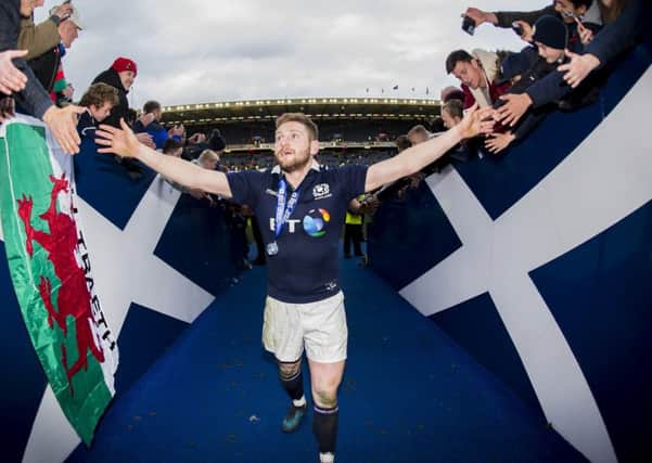 Finn Russell acclaims Scotland's victory over Wales at full-time on Saturday. Picture: SNS/SRU