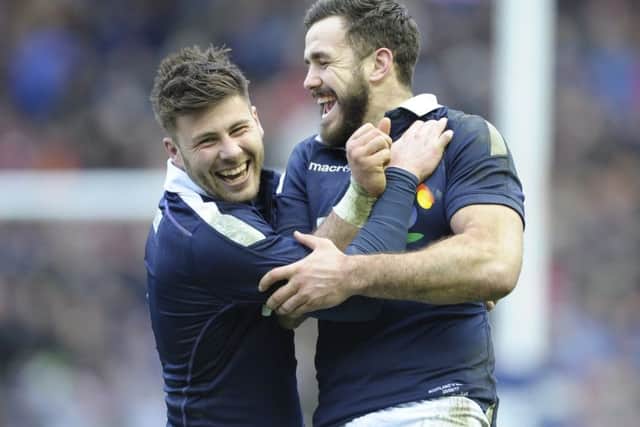 Ali Price and Alex Dunbar celebrate Scotland's victory over Wales. Picture: Neil Hanna