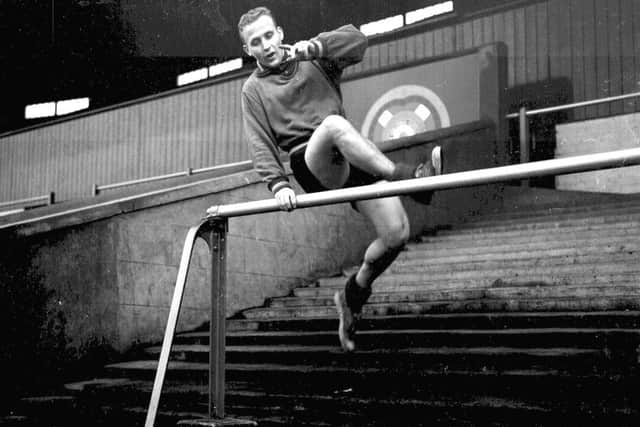 Alex Young training on the terraces at Tynecastle in 1960.