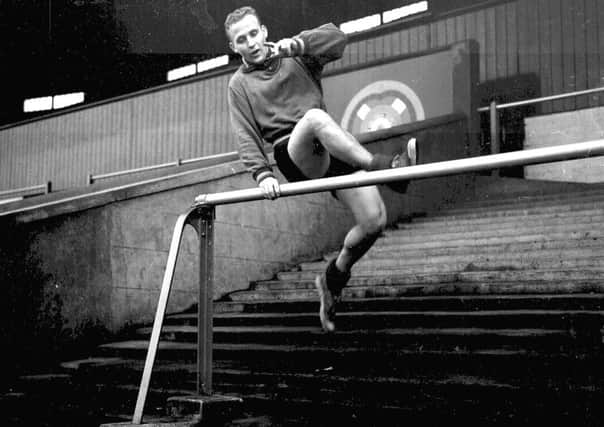 Alex Young training on the terraces at Tynecastle in 1960.