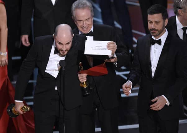 Jordan Horowitz, producer of "La La Land," shows the envelope revealing "Moonlight" as the true winner of Best Picture. Picture: AP