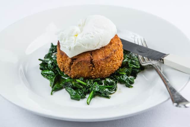 Fishcake, wilted spinach and poached egg. Picture: Paul Johnston/Copper Mango