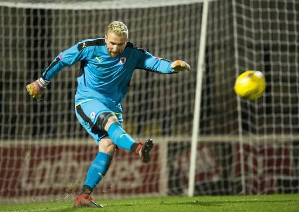 Raith Rovers forward Ryan Stevenson takes a goal-kick as he was forced to take the No 1 jersey against Ayr last night. Picture: Ross MacDonald