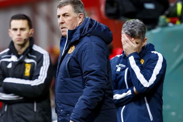A grim-looking Mark McGhee in the Fir Park dugout as Motherwell lost 5-1 to Dundee. Picture: Roddy Scott/SNS