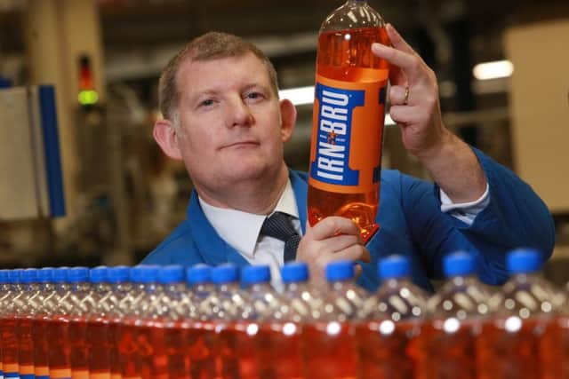 AG Barr boss Roger White said the group will be cutting the sugar content of its flagship Irn-Bru brand. Picture: Stewart Attwood