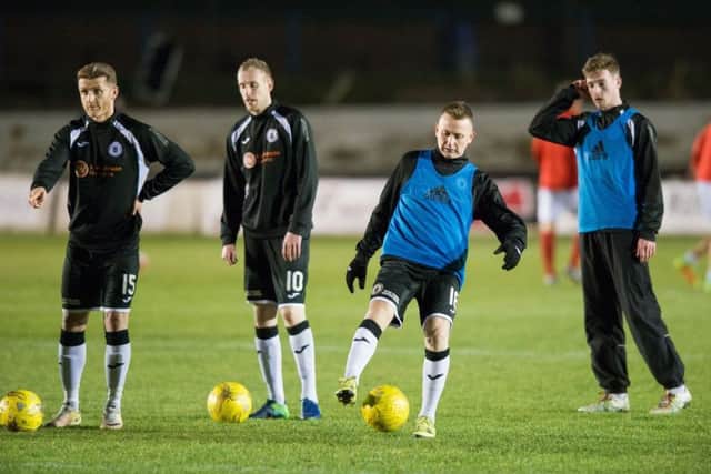 Former Hibs and Celtic striker Derek Riordan warms up before kick-off against Cowdenbeath at new club Edinburgh City on Tuesday, but didn't get on. Picture: Ian Georgeson