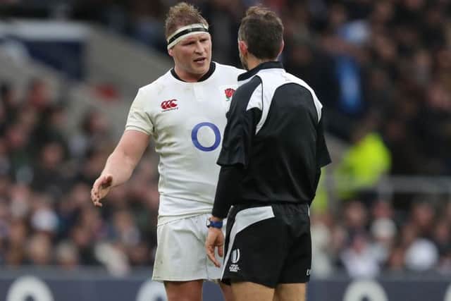 England captain Dylan Hartley speaks to referee Romain Poite during the laboured win over Italy. Picture: Andrew Matthews/PA Wire