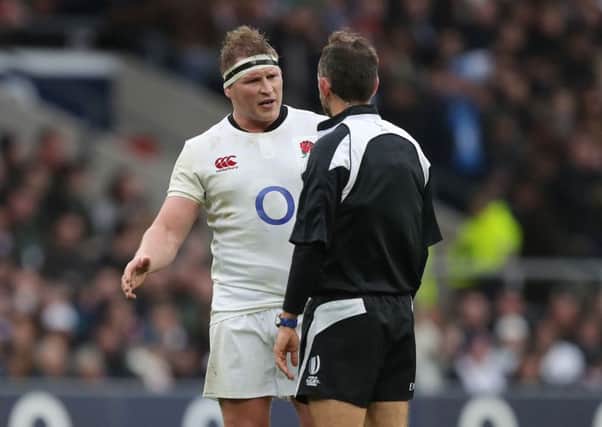 England captain Dylan Hartley speaks to referee Romain Poite during the laboured win over Italy. Picture: Andrew Matthews/PA Wire