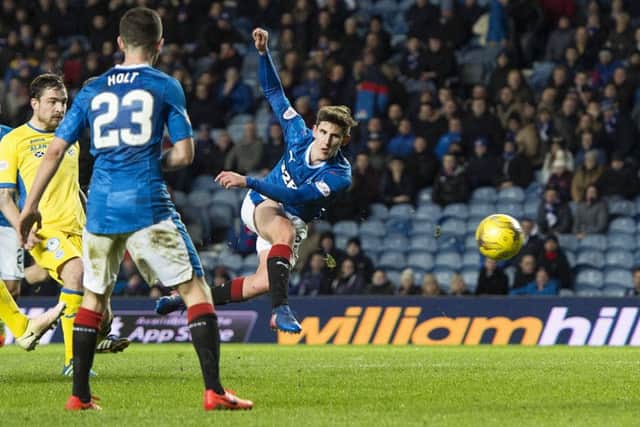 Rangers' Emerson Hyndman volleys home a late winner. Picture: SNS