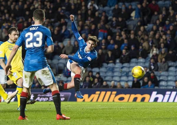 Rangers' Emerson Hyndman volleys home a late winner. Picture: SNS