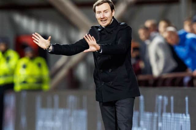 Hearts head coach Ian Cathro watched his side lose 1-0 at home to Ross County. Picture: SNS