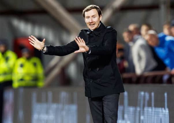 Hearts head coach Ian Cathro watched his side lose 1-0 at home to Ross County. Picture: SNS