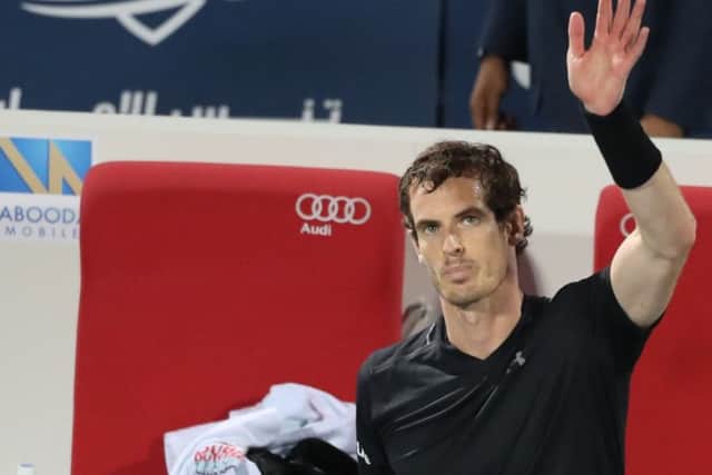 A drained-looking Andy Murray acknowledges the Dubai crowd after his remarkable victory over German Phillipp Kohlschreiber. Picture: Karim Sahib/AFP/Getty Images