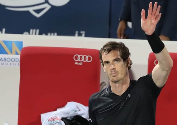 A drained-looking Andy Murray acknowledges the Dubai crowd after his remarkable victory over German Phillipp Kohlschreiber. Picture: Karim Sahib/AFP/Getty Images