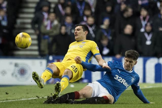 Rob Kiernan was shown a straight red for this challenge on St Johnstone's Graham Cummins. Picture: SNS