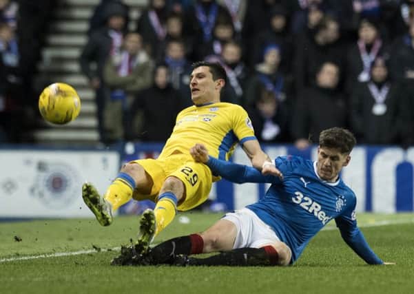 Rob Kiernan was shown a straight red for this challenge on St Johnstone's Graham Cummins. Picture: SNS