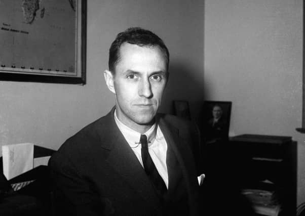 FILE - In this July 4, 1958 file photo, AP Chief of Bureau Sam Summerlin is pictured in his Buenos Aires office. Associated Press foreign correspondent Summerlin, who flashed the news to the world that the Korean War had ended and who reported on everything from Latin American revolutions to U.S. race riots during a long and distinguished career, has died at age 89. He died Monday, Feb. 27, 2017, at a care home in Carlsbad, Calif., from complications of Parkinsonâ¬"s disease, according to his daughter, Claire Slattery of Encinitas, Calif. (AP Photo, File)