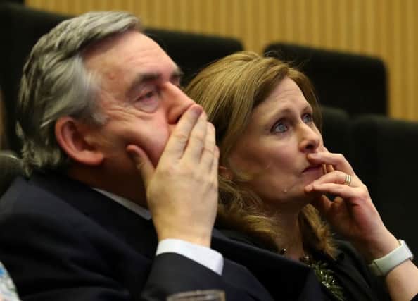 Former prime minister Gordon Brown and his wife Sarah as they listen to speeches at the Jennifer Brown Research Laboratory in Edinburgh. Photo: Andrew Milligan/PA Wire