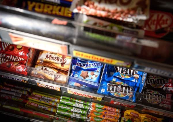 Cancer Research UK is warning that Scotland's sweet tooth is putting the country on track for an epidemice of obesity and associated cancers. Picture: Leon Neal/Getty Images