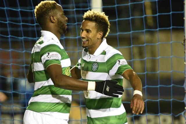 Celtic striker Moussa Dembele, left, celebrates his second goal against Inverness in midweek with Scott Sinclair. Picture: Ian Rutherford/PA Wire