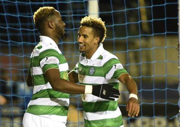Celtic striker Moussa Dembele, left, celebrates his second goal against Inverness in midweek with Scott Sinclair. Picture: Ian Rutherford/PA Wire