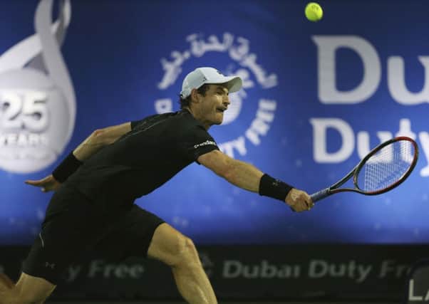 Andy Murray returns the ball to Lucas Pouille of France during their semi-final at the Dubai Tennis Championships. Picture: AP Photo/Kamran Jebreili