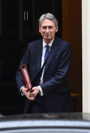 Chancellor Philip Hammond said Britain would work to secure a Brexit deal in its interests. Kirsty O'Connor/PA Wire
