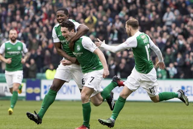 Marvin Bartley celebrates with John McGinn after the midfielder put Hibs into the lead. Picture: SNS.