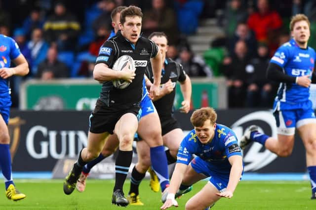 Mark Bennett breaks away to score his long-range try against Dragons. Picture: SNS.