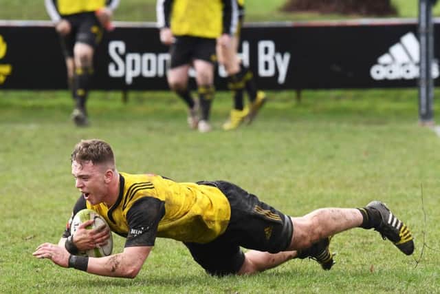 Lewis Carmichael goes over for his try to strengthen Melroses grip on the game. Picture: SNS/SRU.