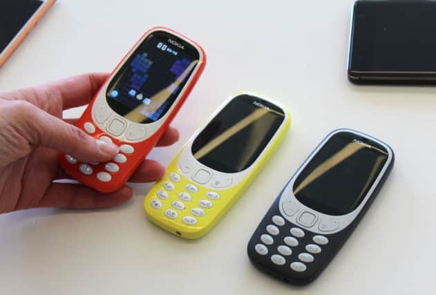 Ben Hutton gives his verdict on the retro Nokia 3310 handset. Picture: Martin Landi/PA Wire