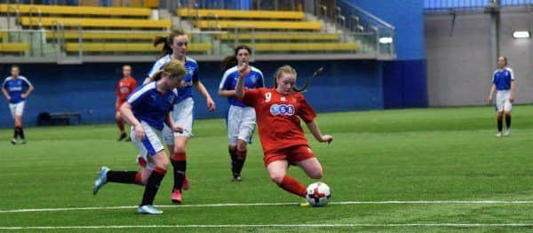 Chelsea McEachran (St Mungos High School) opens the scoring for Scotland (Girl in red).