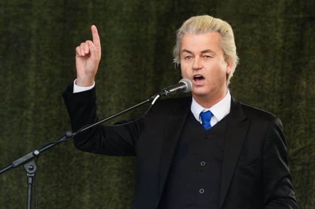 Dutch right-wing Party for Freedom (PVV) leader Geert Wilders (R) addresses a rally of German right-wing movement PEGIDA (Patriotic Europeans Against the Islamisation of the Occident)  in Dresden. Picture: AFP/Getty Images