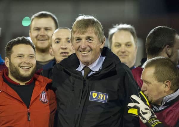 Kenny Dalglish with coach Stephen Tortolano  (in red) at a grassroots awards event in Stirling. 
Picture Ian Rutherford