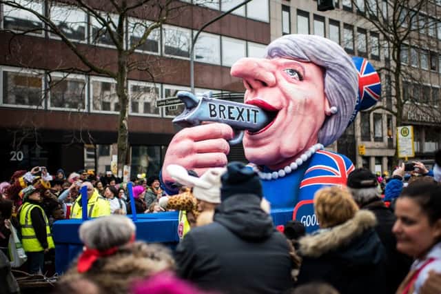 When Theresa May pulls the trigger to activate Article 50 the results will be disastrous, according to this float in the annual Rose Monday parade in the German city of Dusseldorf. Picture:  Lukas Schulze/Getty Images