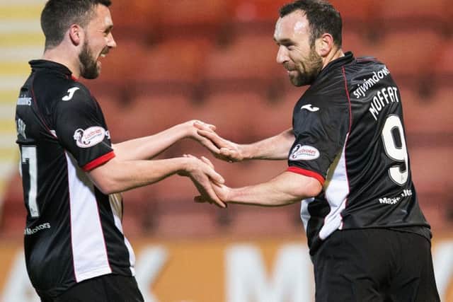 Michael Moffat, right, celebrates his goal with Dunfermline team-mate Nicky Clark. Picture: SNS.