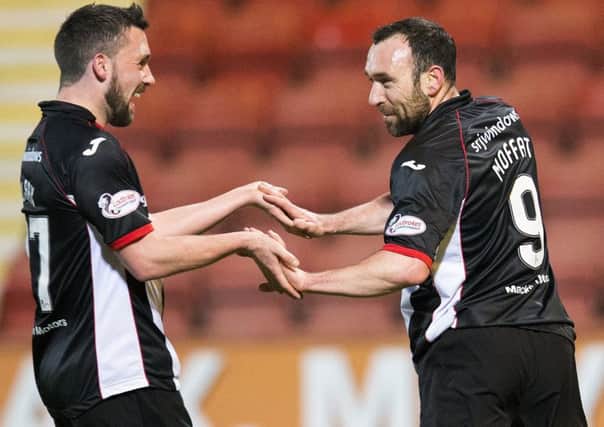 Michael Moffat, right, celebrates his goal with Dunfermline team-mate Nicky Clark. Picture: SNS.