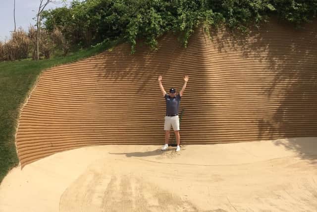 Scotlands Richie Ramsay in one of the huge bunkers at Dlf Golf and Country Club in New Delhi, which is hosting the Hero Indian Open.