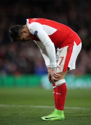 Arsenal's Alexis Sanchez looks dejected during the Champions League defeat by Bayern Munich. Picture: Nick Potts/PA Wire