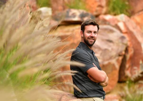 Scotland's Scott Jamieson in front of one of the rock formations at the DLF Golf and Country Club in New Delhi. Picture: Stuart Franklin/Getty Images